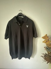 Polo Prada nera con logo