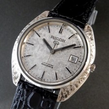 Vintage Ricoh RIQUARTZ Argento