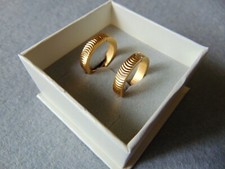 orecchini donna a cerchio in acciaio inox color oro lavorati