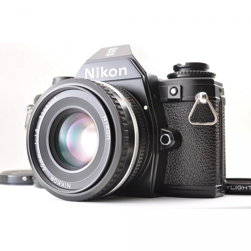 Nikon black slr 35mm film - em,