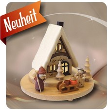 Casa con luci con Babbo Natale