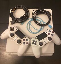 vendo ps4 bianca, usata, due controller, con giochi vari