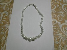 collier  di perle a scalare