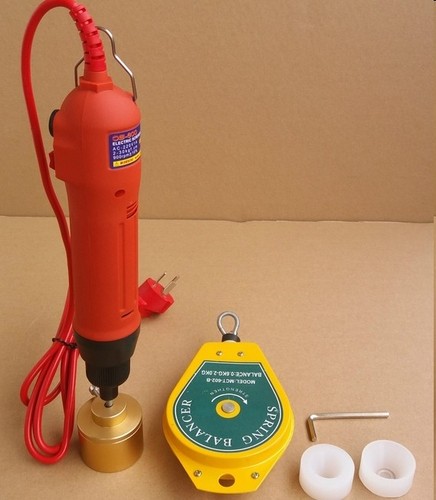 Tappatrice elettrica manuale - , a