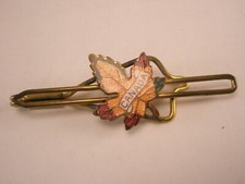 Fermacravatta smaltata vintage