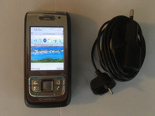 Nokia E65 - Telefono Cellulare GSM/UMTS - Con caricabatteria