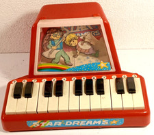 PIANOLA GIOCATTOLO-Star Dreams-CON EFFETTI LUCE-VINTAGE-D'EPOCA-A BATTERIA-USATO