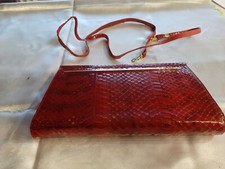 CLUTCH IN PITONE ROSSA USATA