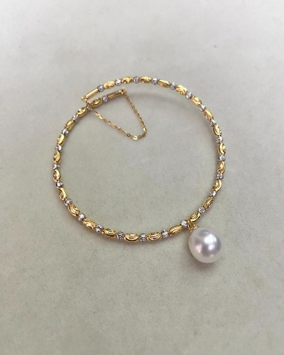 Bracciale 870 perle bianche - £870,