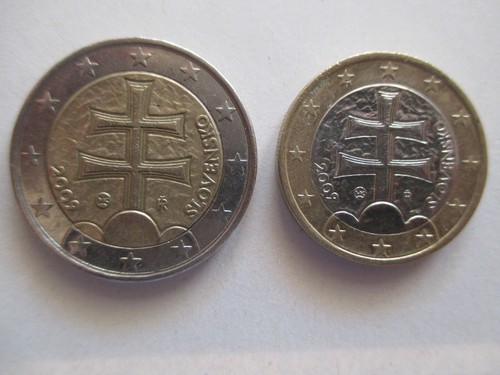 Due monete usate euro ed - monete,