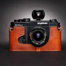 Custodia mezza fotocamera in