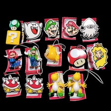 Lotto 14 Sorprese Super Mario Kinder Joy 2025 (con cartine)