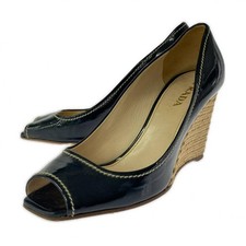 Rari sandali Prada con zeppa