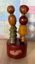 Antichi pupazzi in legno push