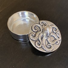 Portagioie in metallo polpo sorridente con coperchio tondo argento lucido decorativo