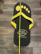 Insegna scivolo piede sandalo