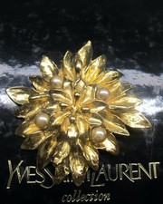 Rare Broche fleur Yves Saint Laurent YSL vintage , dorée , signée , authentique.