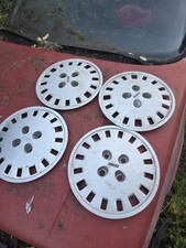 set copricerchi, borchie Fiat Uno 45 - 55 - 65 Sting Mk1 originali