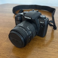 Sigma SA7N fotocamera reflex pellicola con obiettivo 28-80 mm e cinturino - NON TESTATA