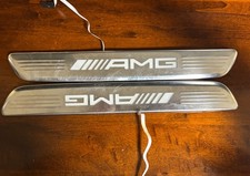 Battitacco ORIGINALI soglia porta acciaio 2 pezzi LED AMG per Mercedes-Benz