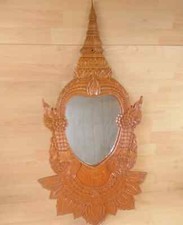 Specchio in legno intagliato