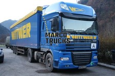 Foto camion DAF XF 105.460 autoarticolato telonato Germania blu WITTWER #d9yv