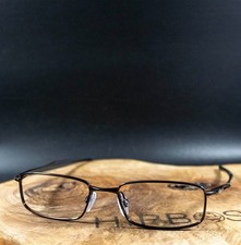 Oakley Casing OX3110-0254 montatura per occhiali da vista da uomo marrone lucido