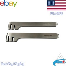 1 paio di ferri piegapiastre