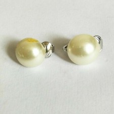 Orecchini clip lobo vintage anni 80 in metallo argentato firmati Sarah Coventry