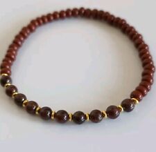 bracciale elastico uomo con  granato 