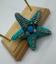 Spilla stella marina azzurra strass e perline - NUOVO