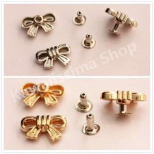 Borchie sfuse a fiocco con