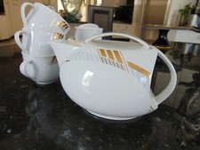 THUN STUDIO DELTA SERVIZIO DA TÈ SET PORCELLANA. ELEGANTE SPLENDIDO SET A RIGHE DORATE.