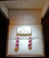 ORECCHINI TRILOGY IN ORO BIANCO 18 KT. TIT. 750 CON RUBINI E BRILLANTI.