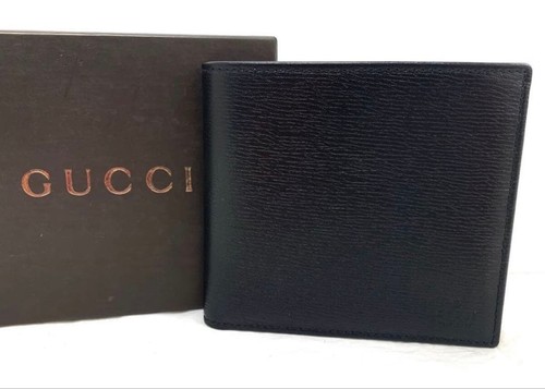T04 gucci portafoglio - 76,
