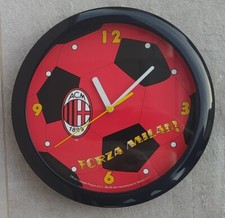 MILAN - OROLOGIO (CON LOGO E SLOGAN) DA PARETE A FORMA CIRCOLARE IN PLASTICA