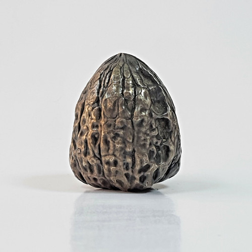 Scultura noce argento sterling