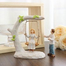 Statuette di coppie in