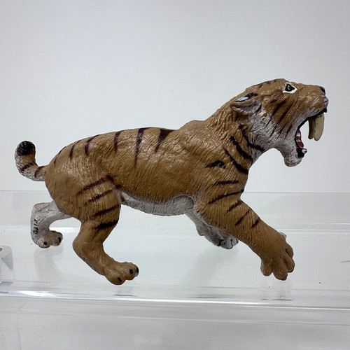 Statuina safari ltd saber - safari,