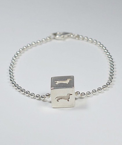 Ciondolo argento dado con - a,