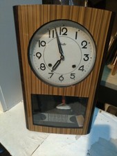 OROLOGIO A PENDOLO IN LEGNO LACCATO "JACKY" VINTAGE ANNI '70. NON TESTATO 