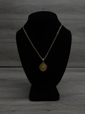 Collana con ciondolo tondo