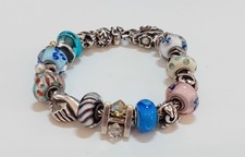 Bracciale Trollbeads in argento sterling 925 con ciondoli ritirati