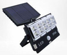 LED headlight with solar panel