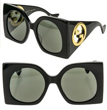 Occhiali da sole unisex Gucci 1254 nero oro logo Gg1254S maschera oversize piatta 001