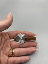 Fermacravatta sega circolare