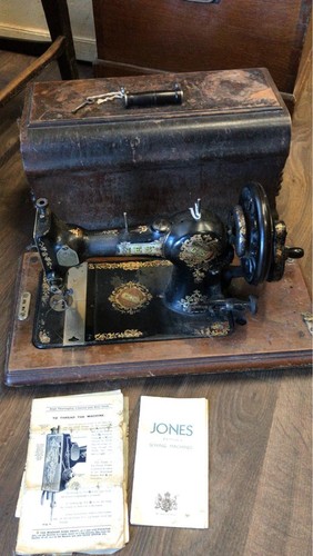 Antique iron jones - hand, crank