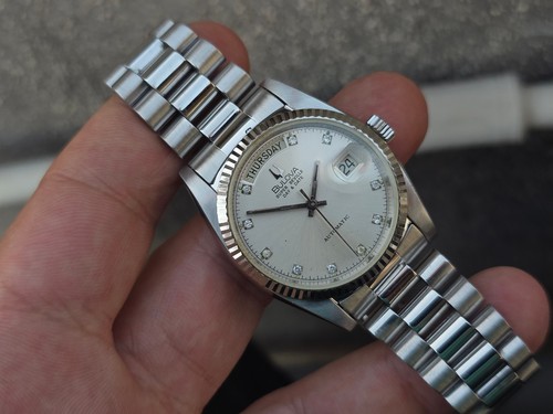 Bulova super seville day date - seville,