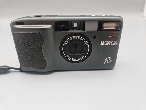 Obiettivo ricoh - /,