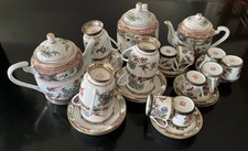 Servizio da te (6) e caffè (12) in Argento E Porcellana.